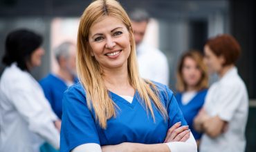 front-view-of-of-woman-doctor-looking-at-camera-co-98NJRV7.jpg